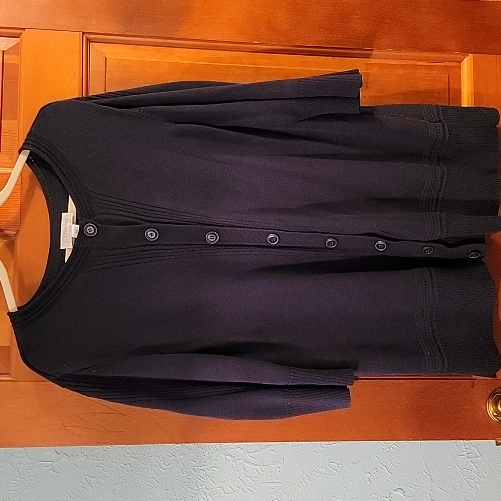 Button cardigan sweater.